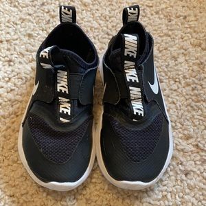 Black and White Nike Flexrunner Slip-Ons